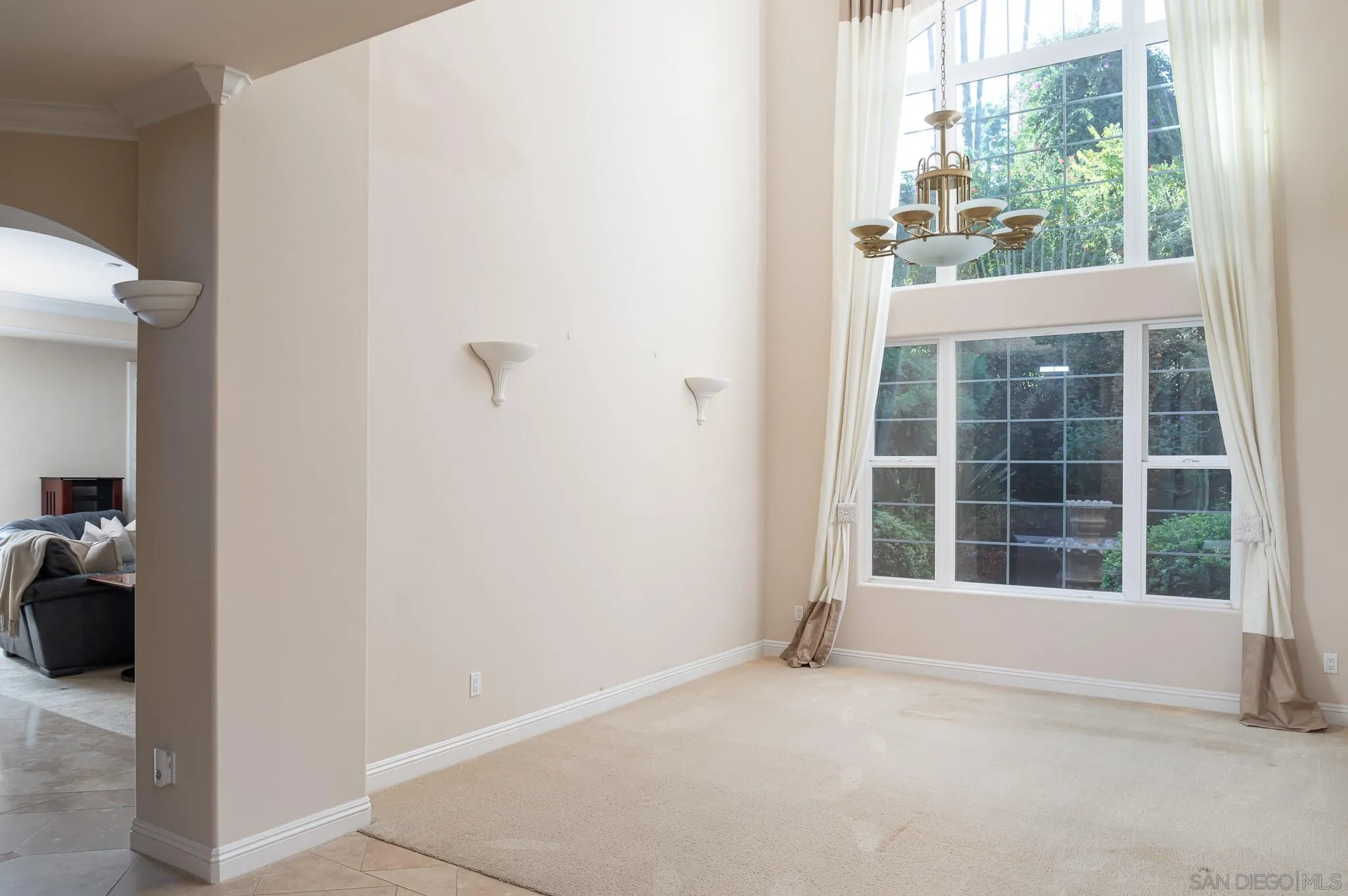 16319 Martincoit Road Poway, CA 92064 - Photo 4 of 29 a view of an empty room with a window