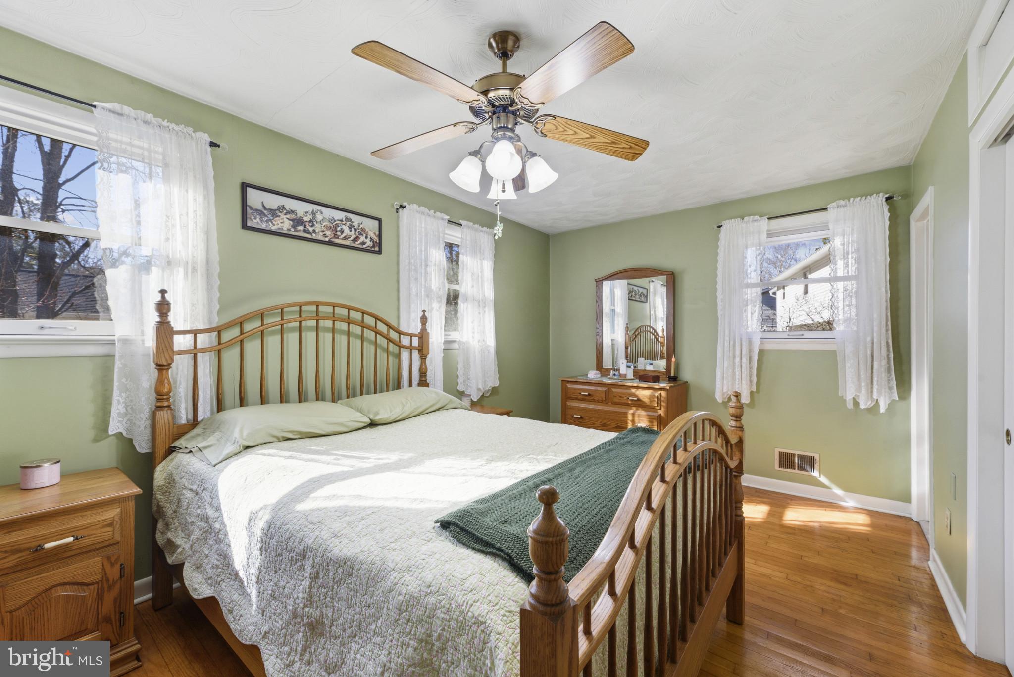 2019 Valley Road Annapolis, MD 21401 - Photo 13 of 42 a bedroom with a bed and a chandelier