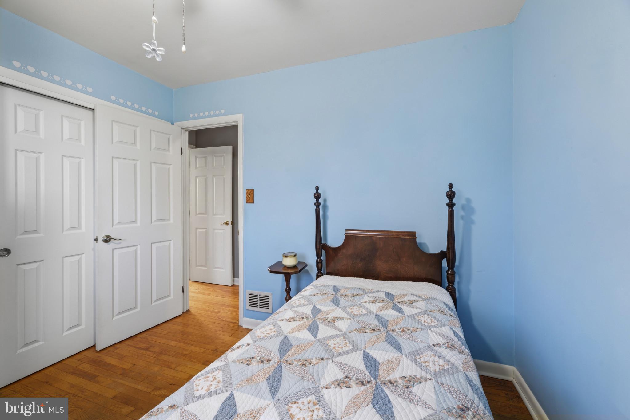 2019 Valley Road Annapolis, MD 21401 - Photo 20 of 42 a bedroom with a bed and wooden floor