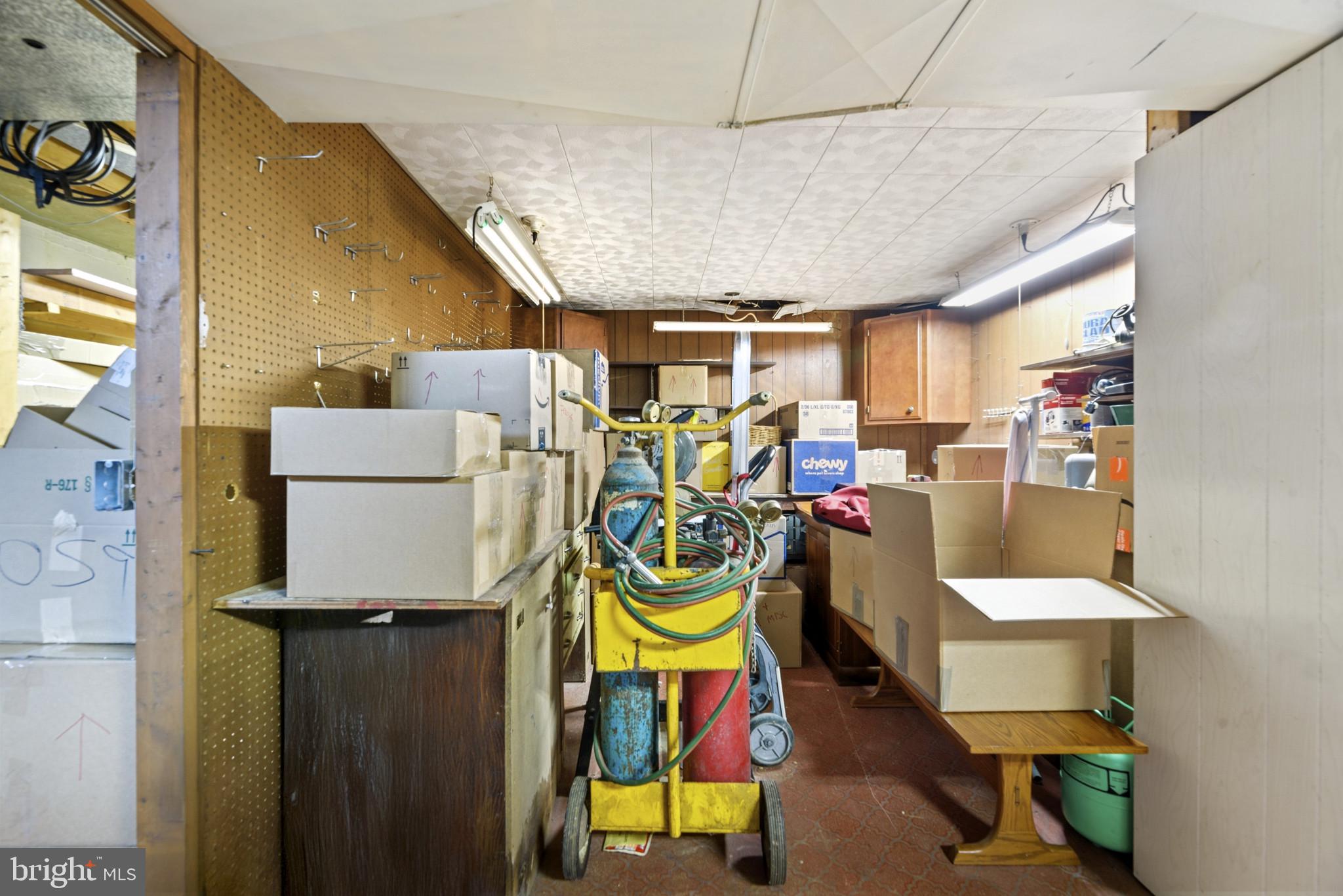 2019 Valley Road Annapolis, MD 21401 - Photo 33 of 42 a room with musical instruments and wooden shelves