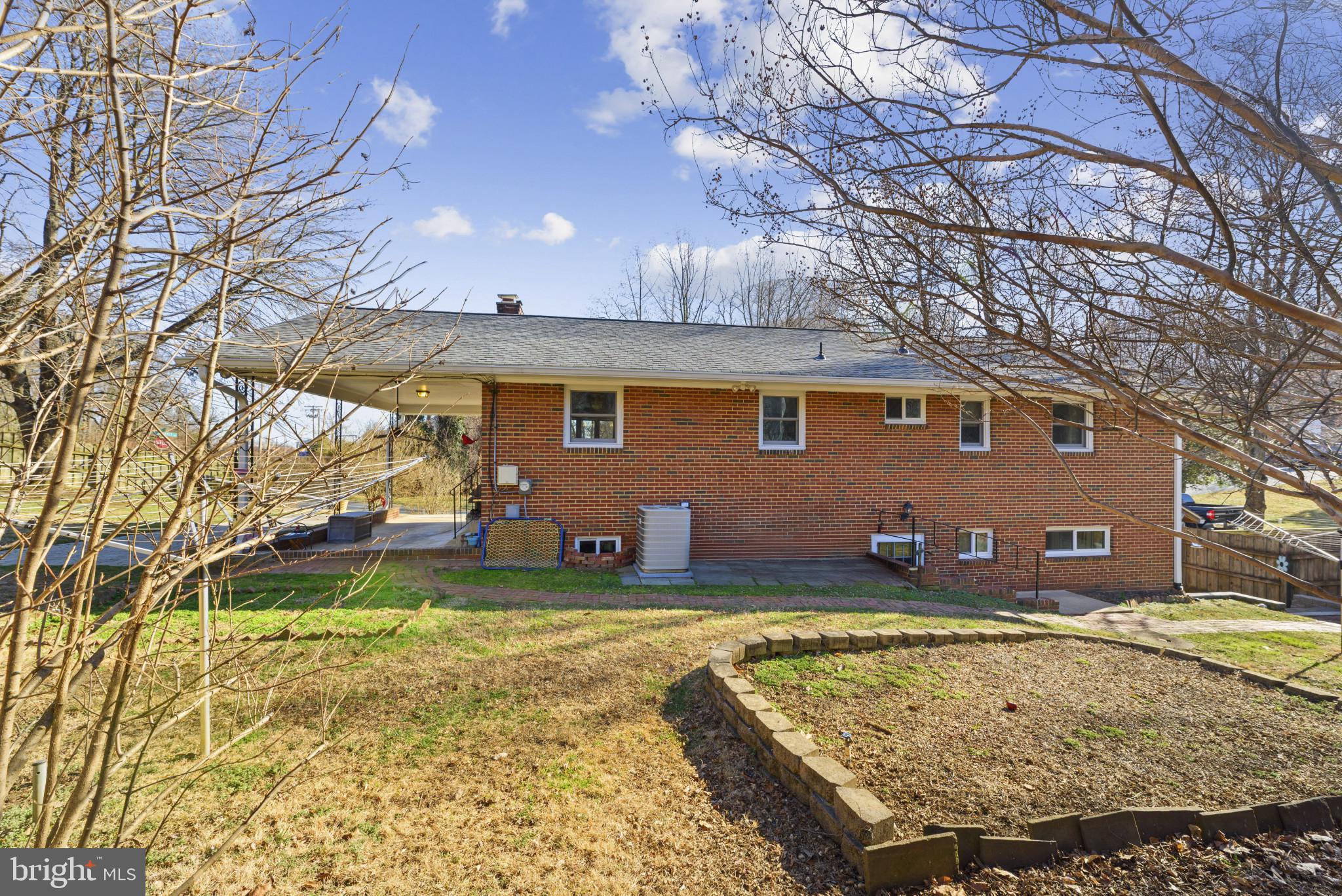 2019 Valley Road Annapolis, MD 21401 - Photo 37 of 42 a view of a house with a backyard