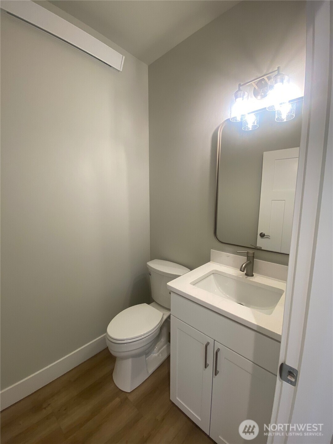 5953 (lot 64) Ranch Loop Ferndale, WA 98248 - Photo 13 of 38 a bathroom with a sink a toilet and a mirror