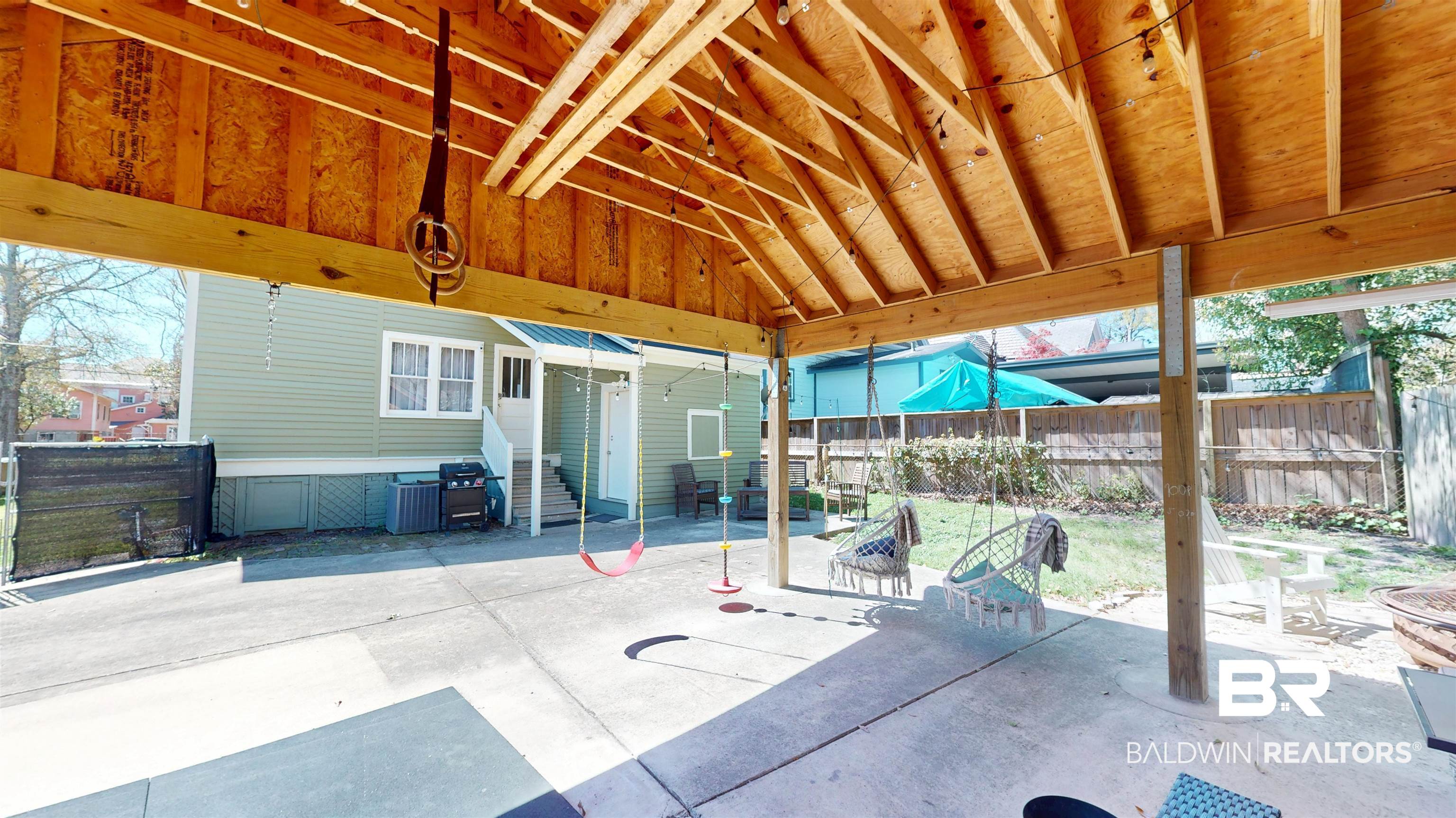 1154 New St Francis Street Mobile, AL 36604 - Photo 6 of 37 View of patio with entry steps and fence