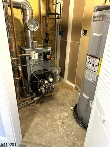 a room with wooden cabinets and glass door