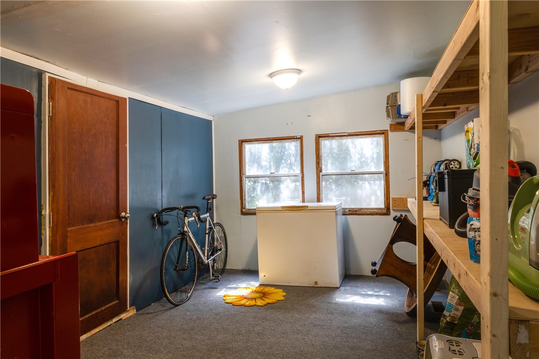 5885 County Road 11 Alpine, NY 14805 - Photo 36 of 37 Utility/ storage room leading to the back yard