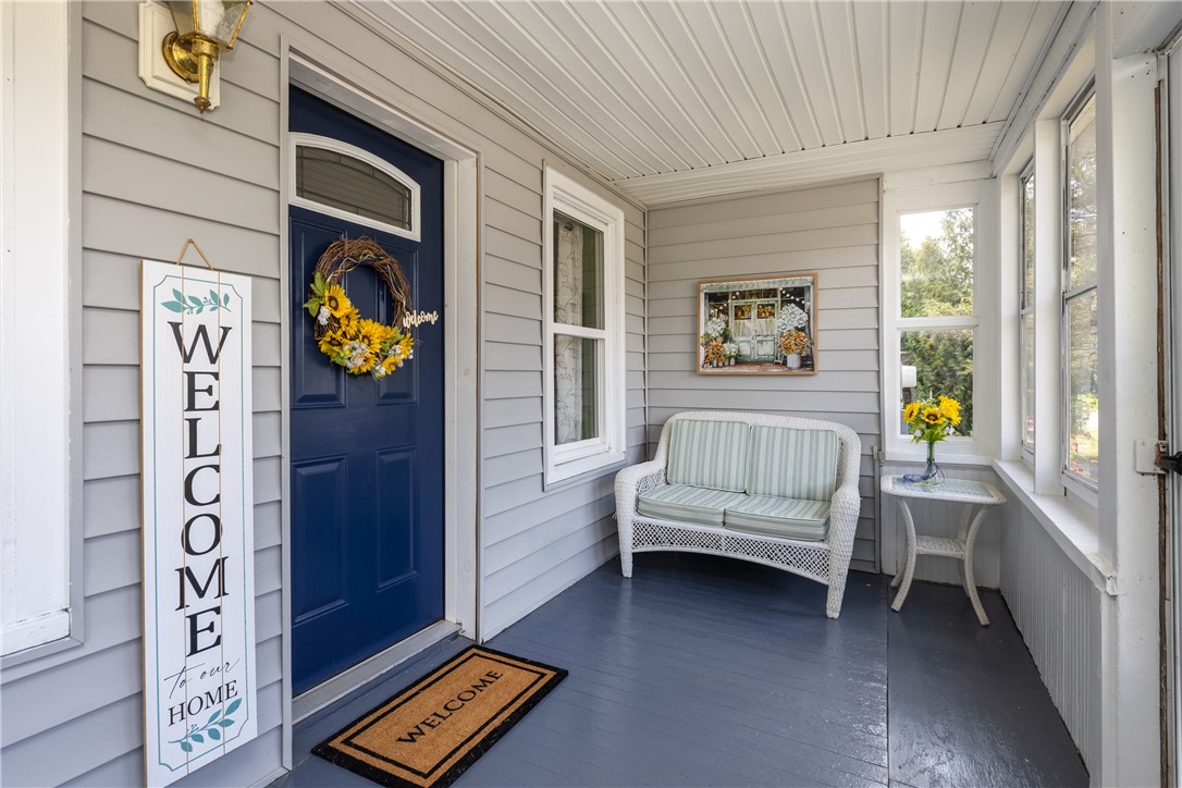 5885 County Road 11 Alpine, NY 14805 - Photo 6 of 37 A charming and enclosed front porch to greet you.