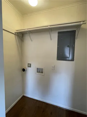 a bathroom with a sink mirror and toilet
