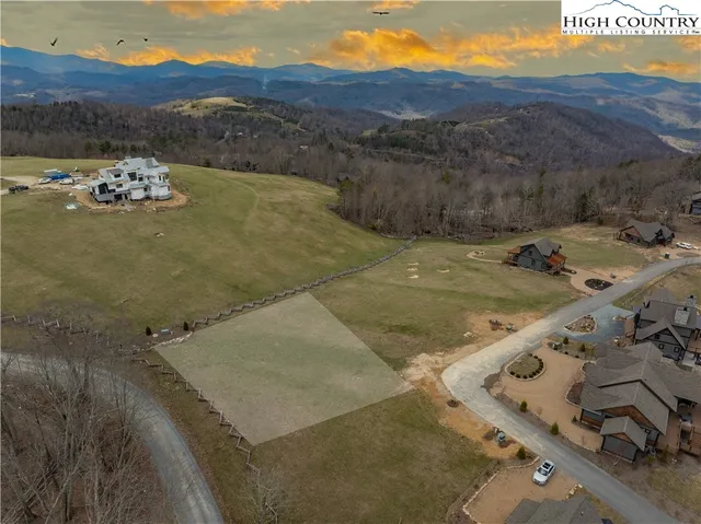 a view of a yard with an outdoor space