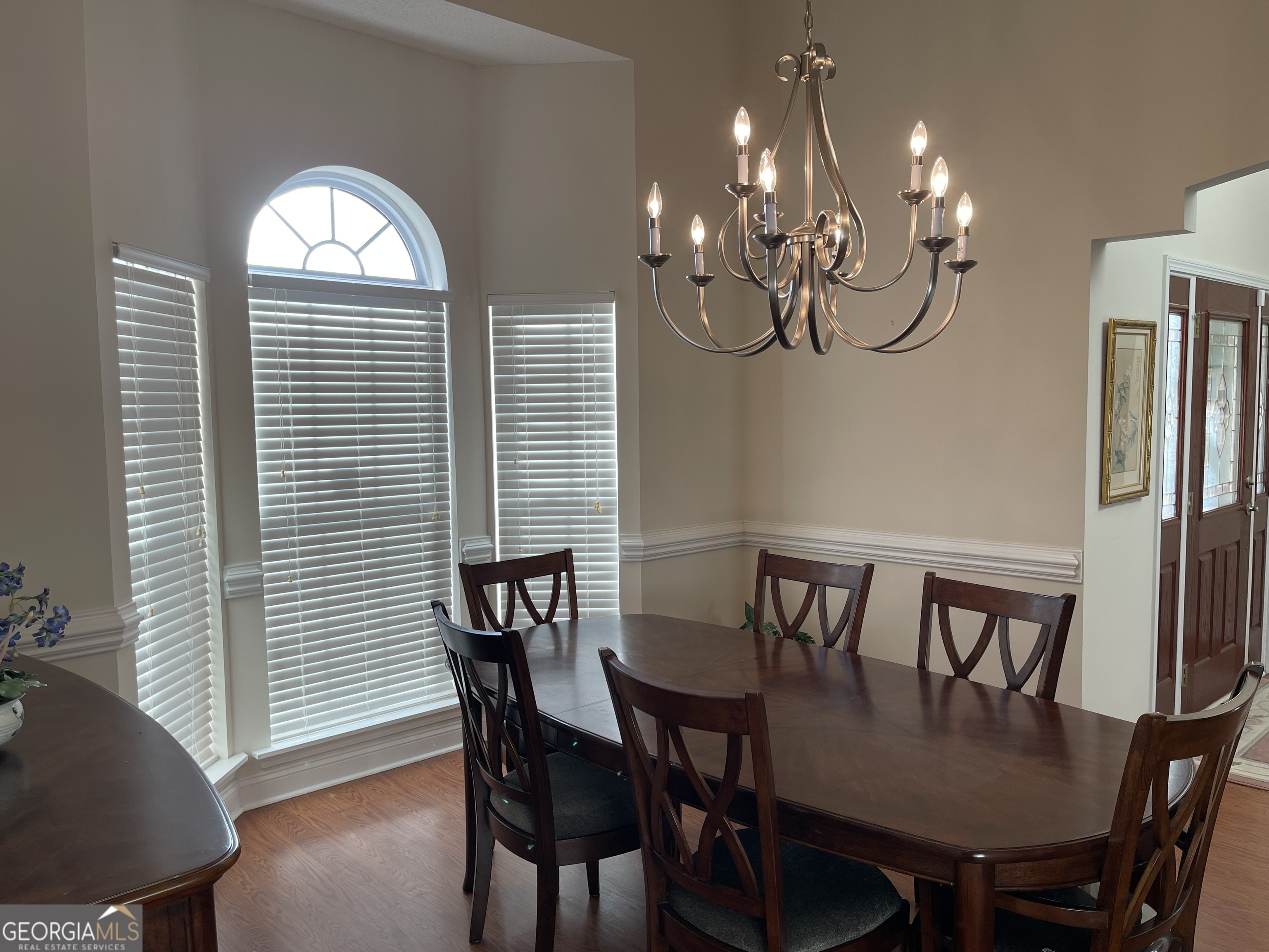 137 Blue Ridge Drive Statesboro, GA 30458 - Photo 11 of 26 a view of a dining room with furniture window and wooden floor