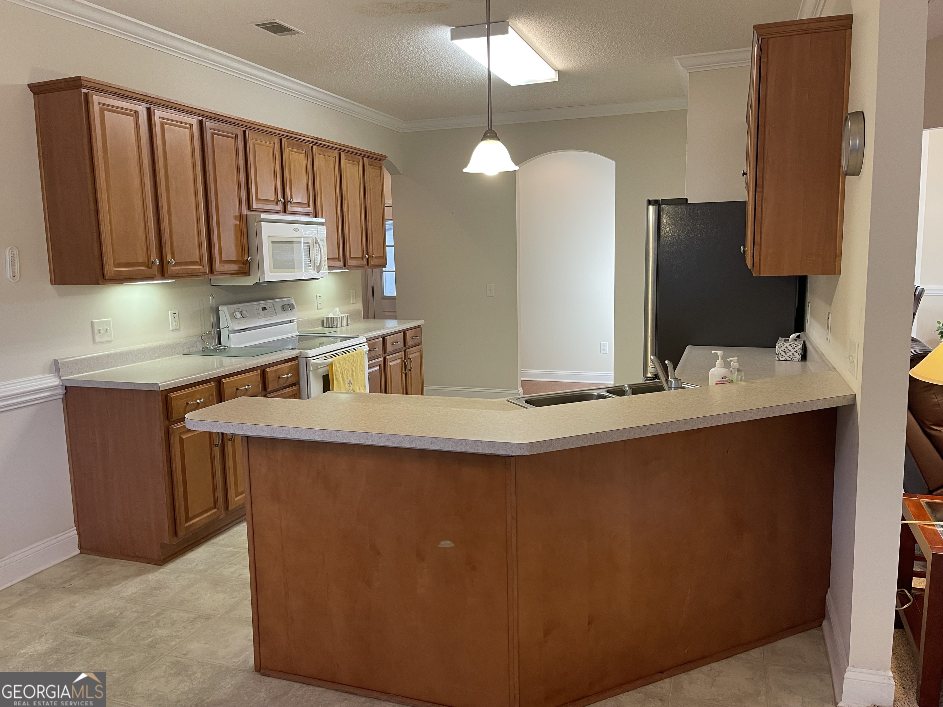137 Blue Ridge Drive Statesboro, GA 30458 - Photo 8 of 26 a bathroom with a sink and a mirror