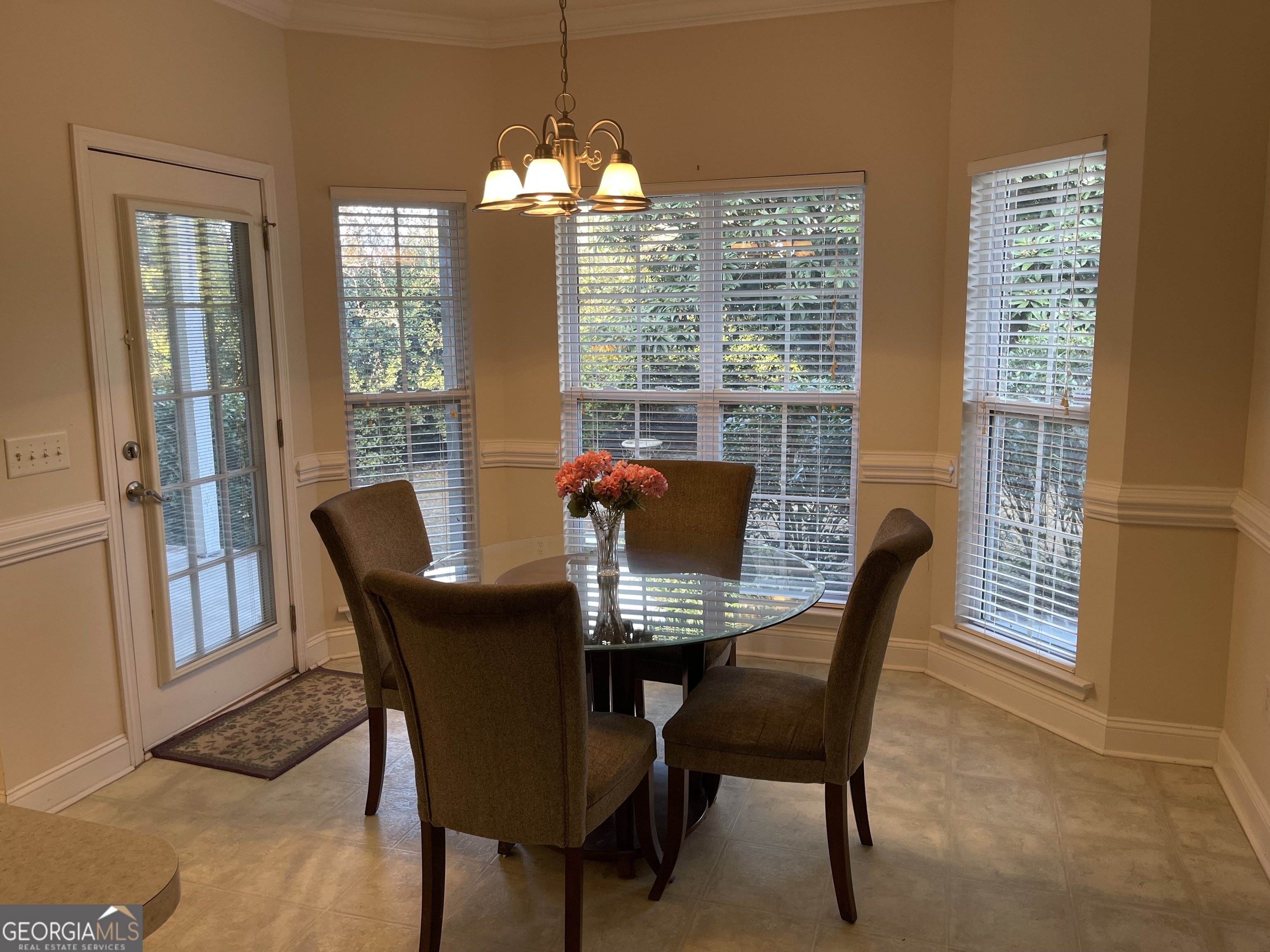 137 Blue Ridge Drive Statesboro, GA 30458 - Photo 9 of 26 a view of a dining room with furniture and window