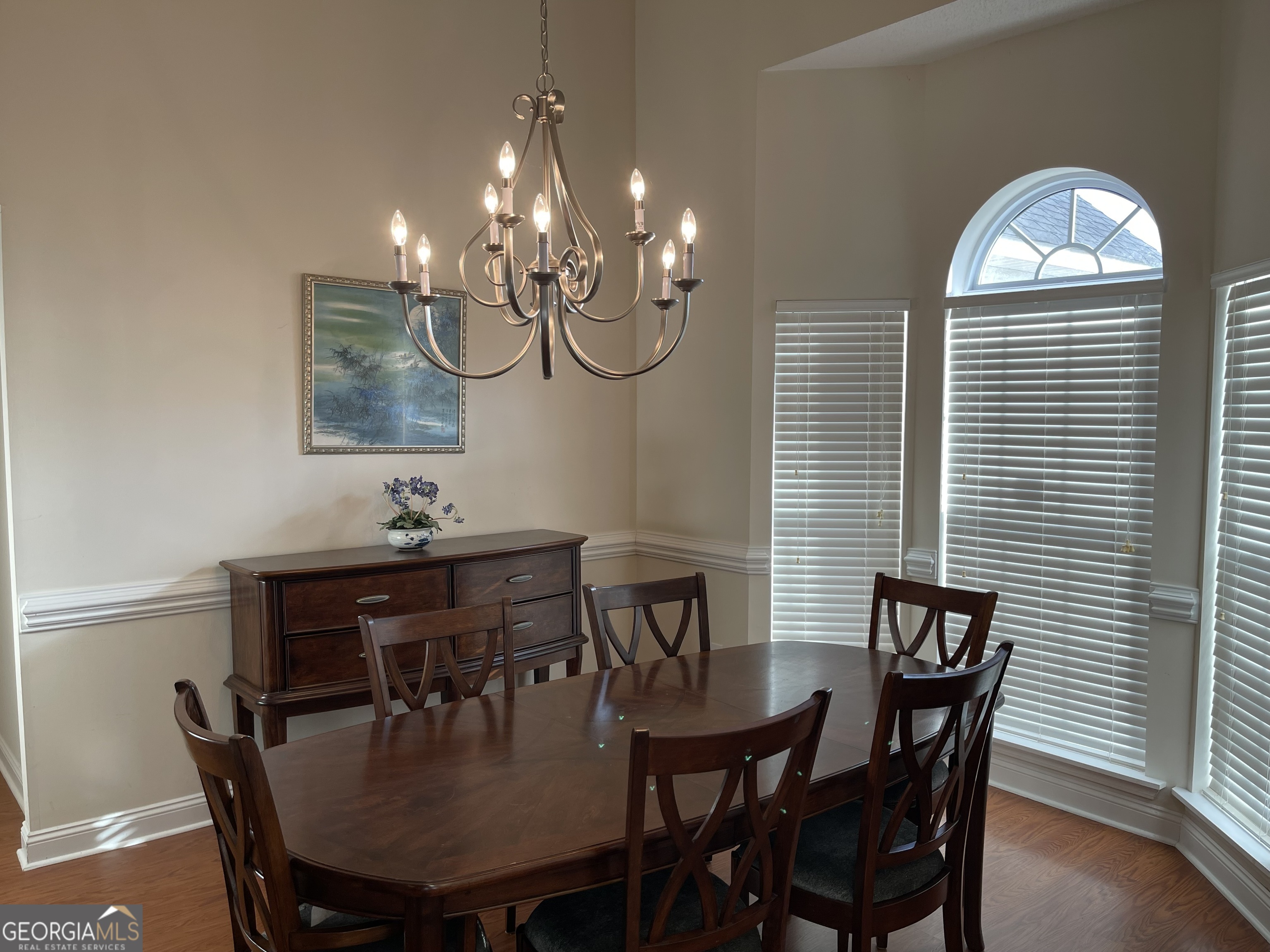 137 Blue Ridge Drive Statesboro, GA 30458 - Photo 10 of 26 a view of a dining room with furniture and chandelier