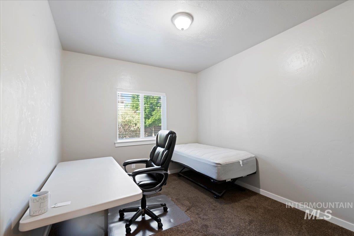 401 East Joshua Tree Drive Meridian, ID 83646 - Photo 17 of 32 Office space featuring carpet floors and baseboards