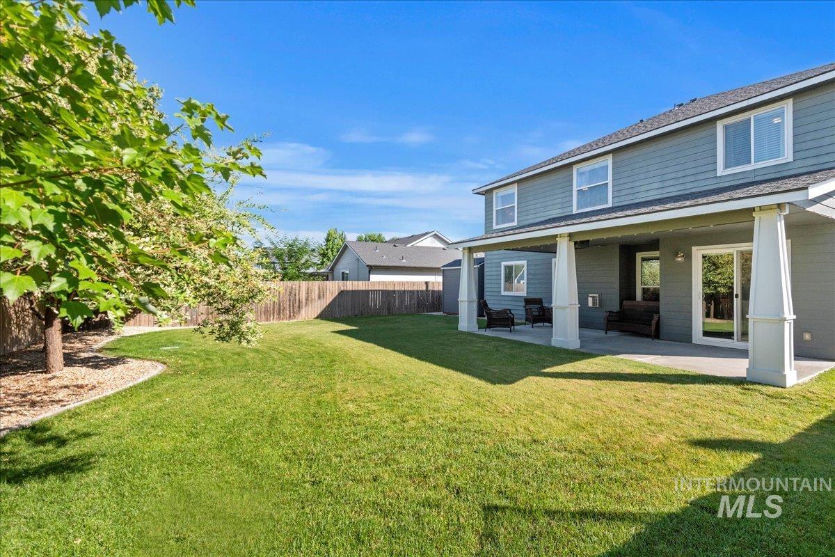 401 East Joshua Tree Drive Meridian, ID 83646 - Photo 27 of 32 Fenced backyard featuring a patio area