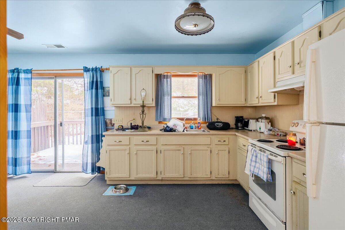 626 Northway Road Linden, PA 17744 - Photo 4 of 28 a kitchen with cabinets appliances and a window