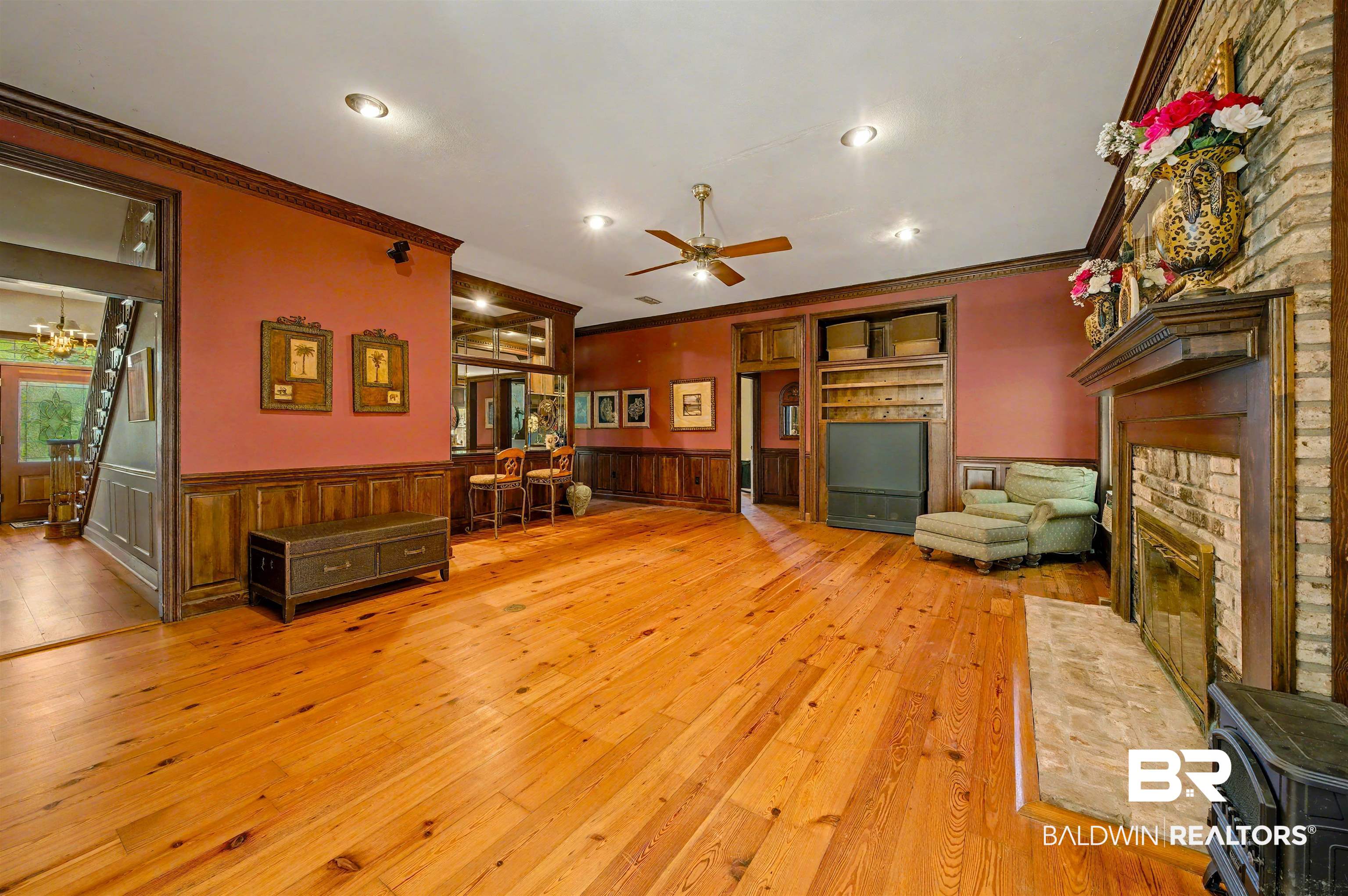15810 County Road 73 Foley, AL 36535 - Photo 46 of 56 Living area with crown molding, light wood-style floors, a ceiling fan, wainscoting, and recessed lighting