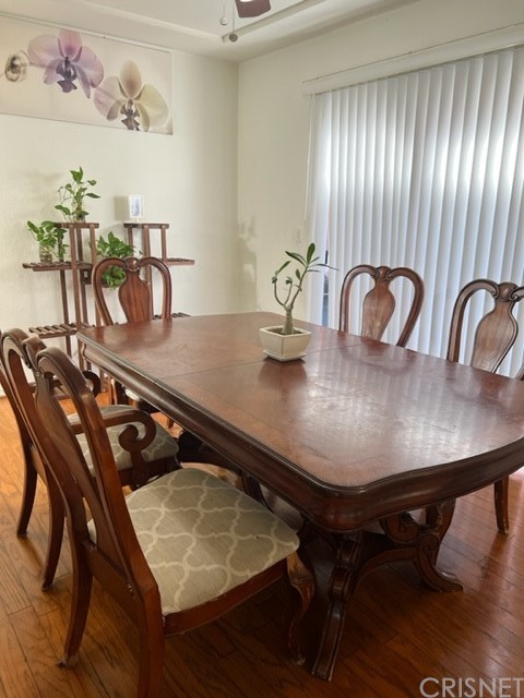 7267 Corbin Avenue, Unit B Winnetka, CA 91306 - Photo 2 of 8 a view of a dining room with furniture and window