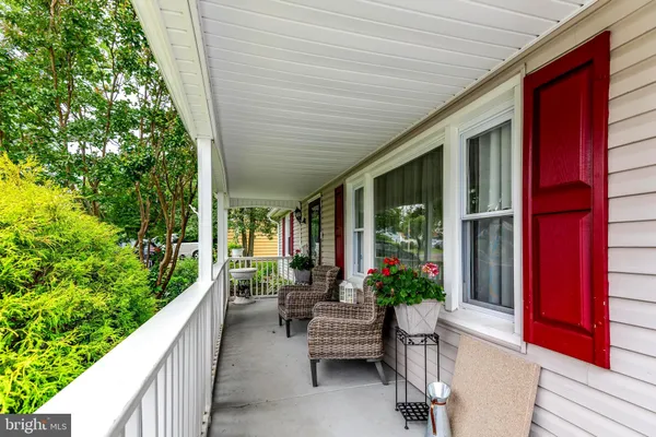 a view of a patio filled with furniture