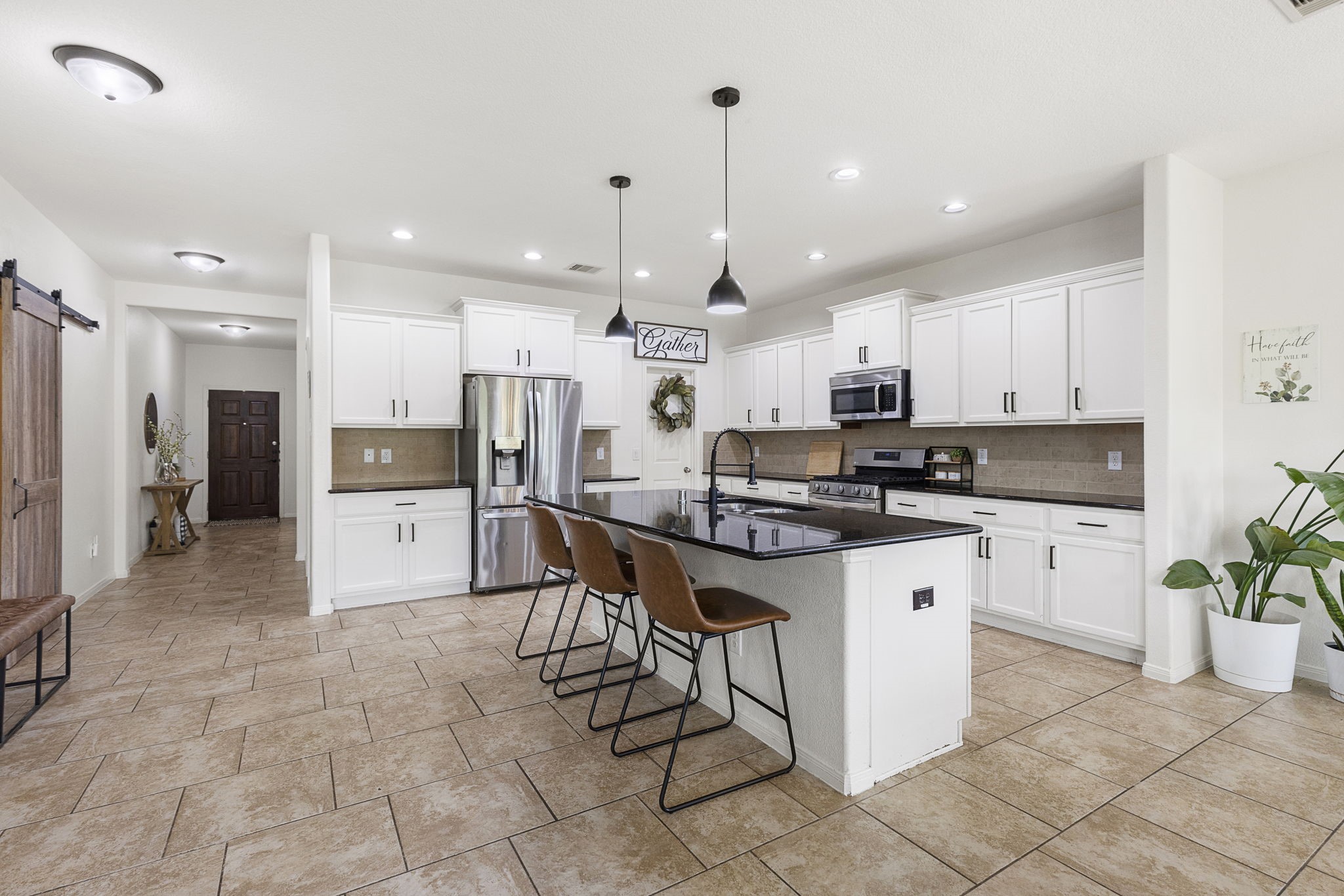 22810 Dale River Road Tomball, TX 77375 - Photo 7 of 44 Open concept kitchen making everyday living easy and entertaining a breeze.
