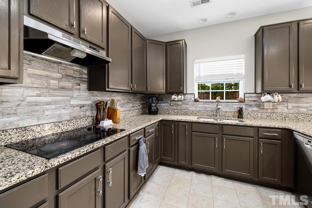 4340 Snowcrest Lane Raleigh, NC 27616 - Photo 12 of 42 Ample Cabinets