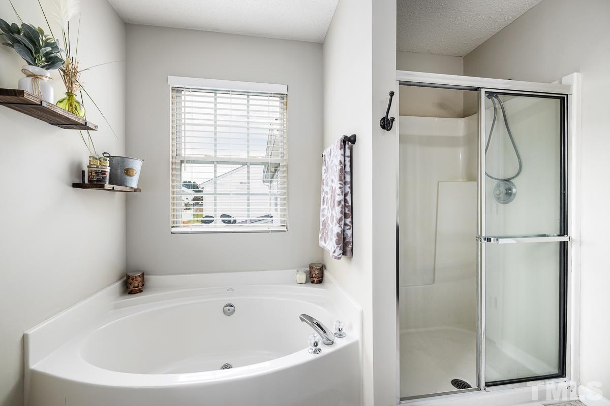 4340 Snowcrest Lane Raleigh, NC 27616 - Photo 33 of 42 Garden Tub separate Shower