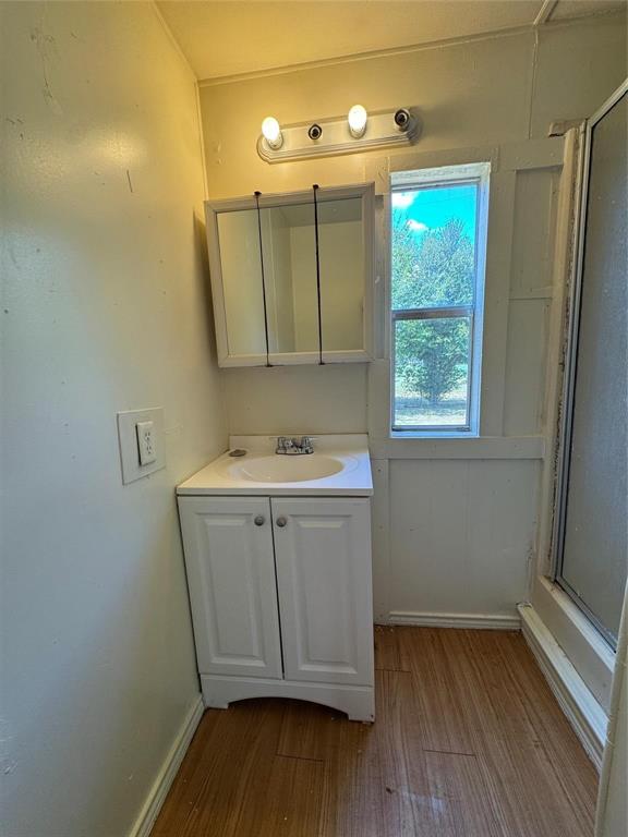 2010 Spring Court, Unit A Azle, TX 76020 - Photo 22 of 29 a bathroom with a sink and a mirror