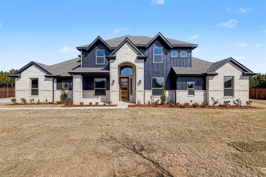 7041 Champion Road Midlothian, TX 76065 - Photo 2 of 30 front view of a house with a outdoor space