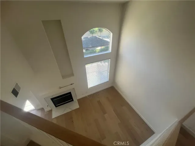 a view of kitchen and wooden floor