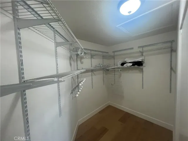 a view of a room with racks on the wall