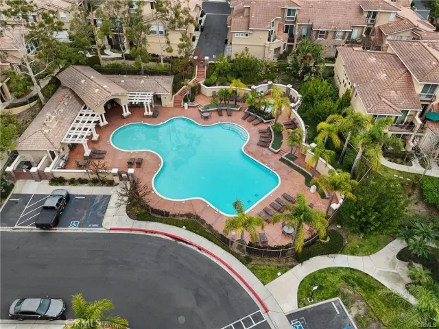 an aerial view of a house with outdoor space
