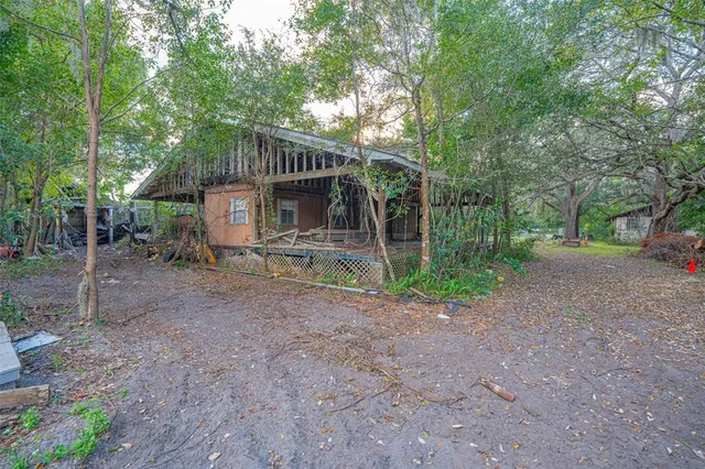 a view of yard with swimming pool