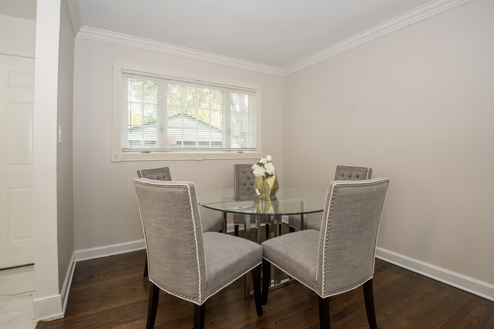 216 Flora Avenue Glenview, IL 60025 - Photo 13 of 40 a view of a dining room with furniture window and wooden floor