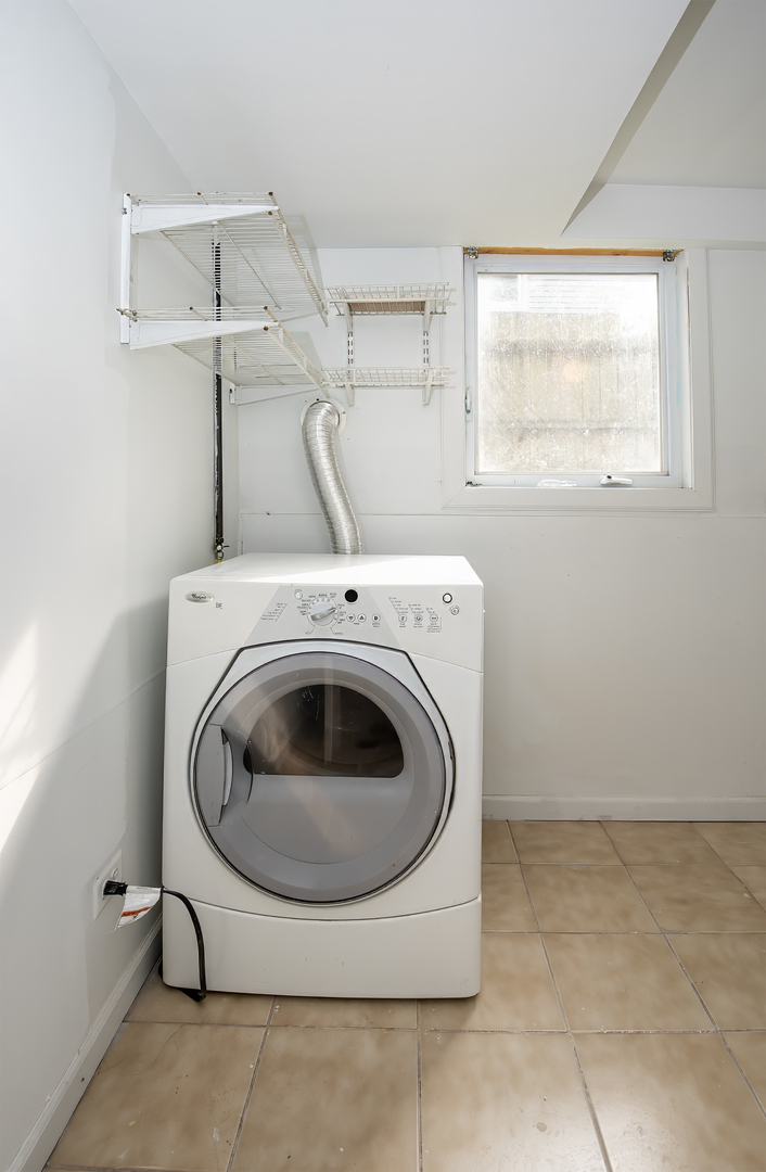 216 Flora Avenue Glenview, IL 60025 - Photo 37 of 40 a utility room with dryer and washer