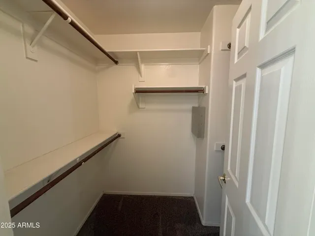 a white toilet sitting next to a bath tub