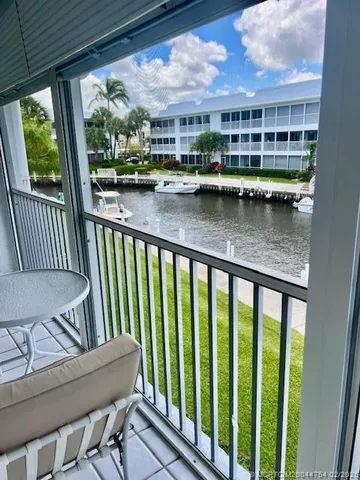 a view of a lake from a balcony