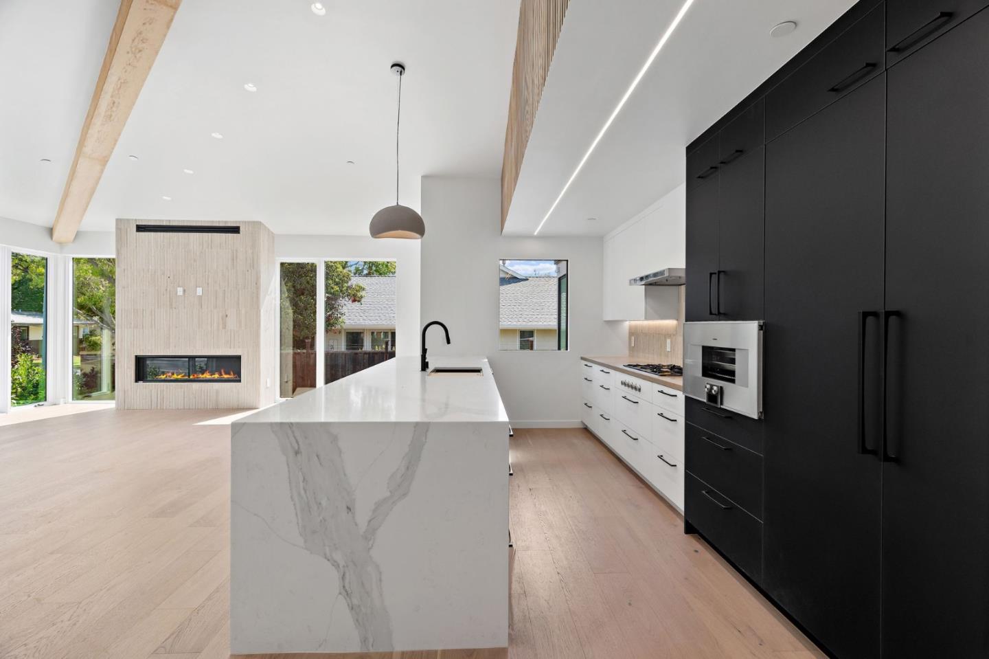 3886 Ross Road Palo Alto, CA 94303 - Photo 16 of 60 a large white kitchen with a large window