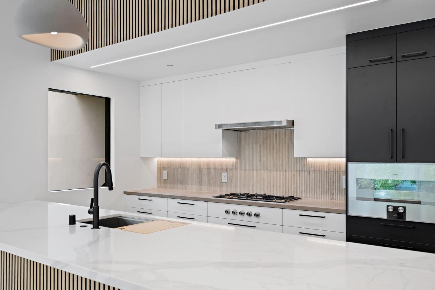 3886 Ross Road Palo Alto, CA 94303 - Photo 17 of 60 a kitchen with a stove and a refrigerator