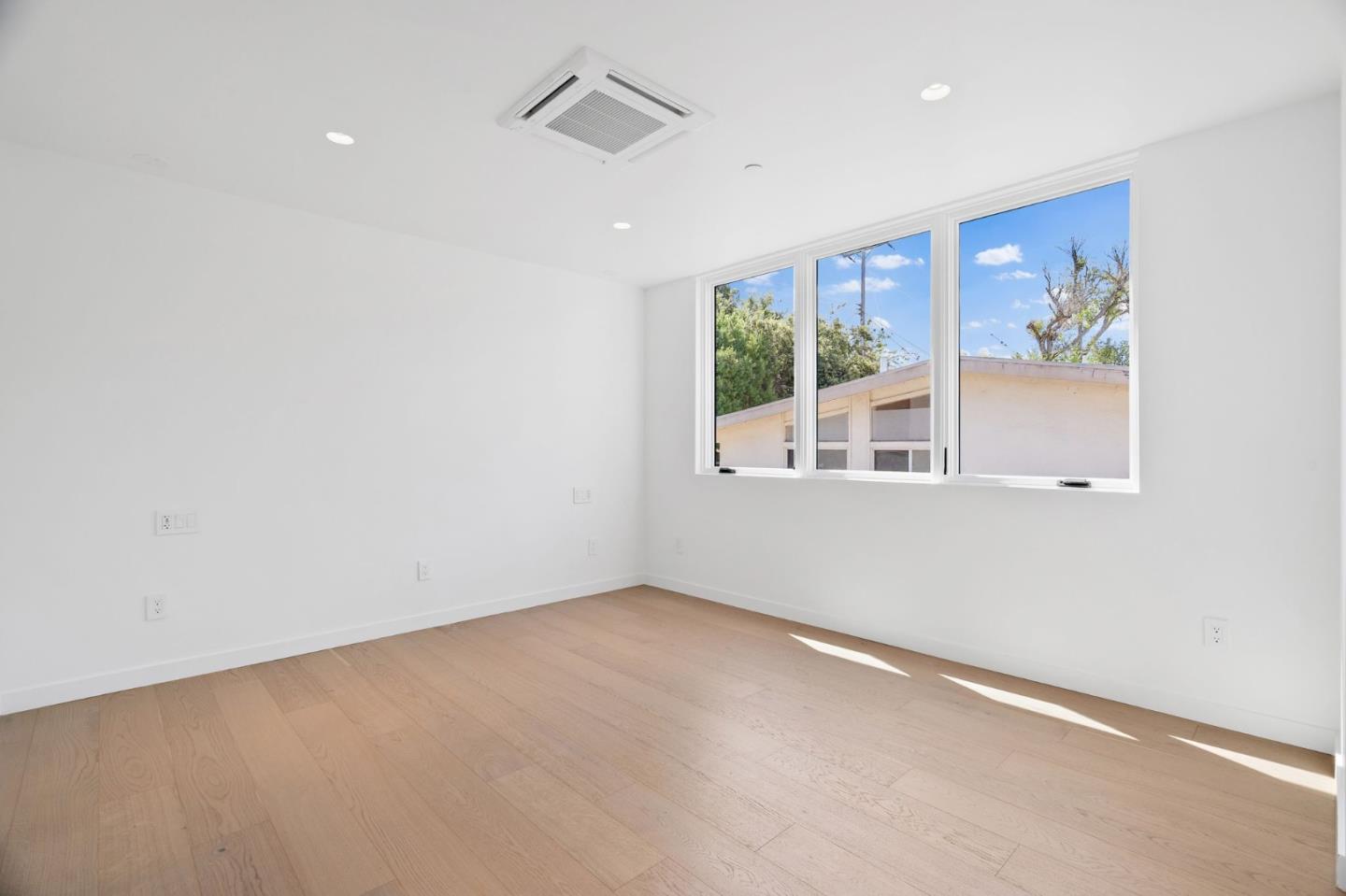 3886 Ross Road Palo Alto, CA 94303 - Photo 24 of 60 an empty room with a window