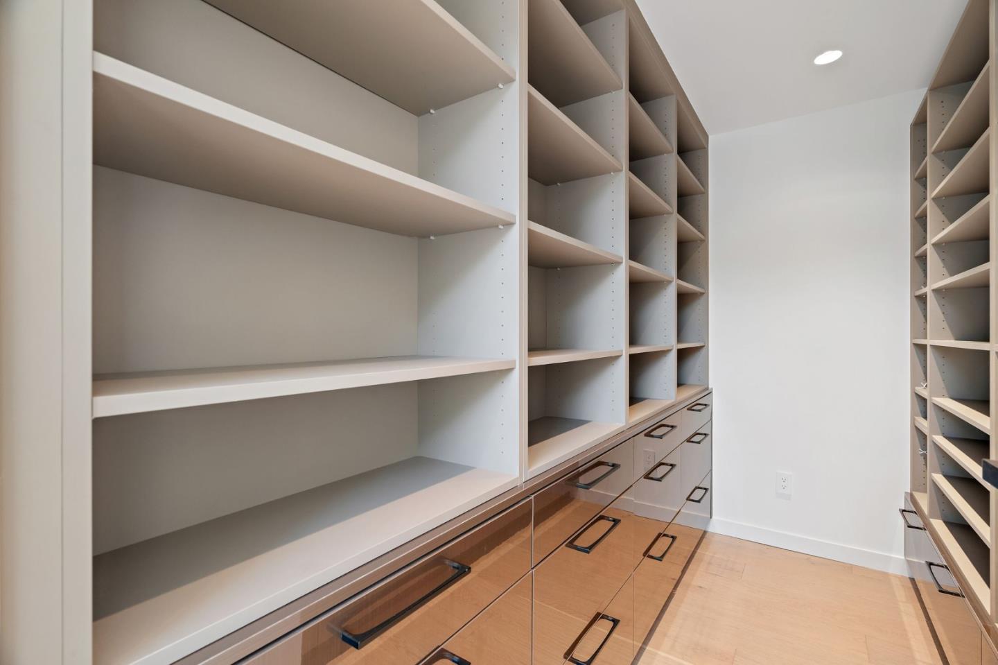 3886 Ross Road Palo Alto, CA 94303 - Photo 28 of 60 a view of walk in closet with empty racks