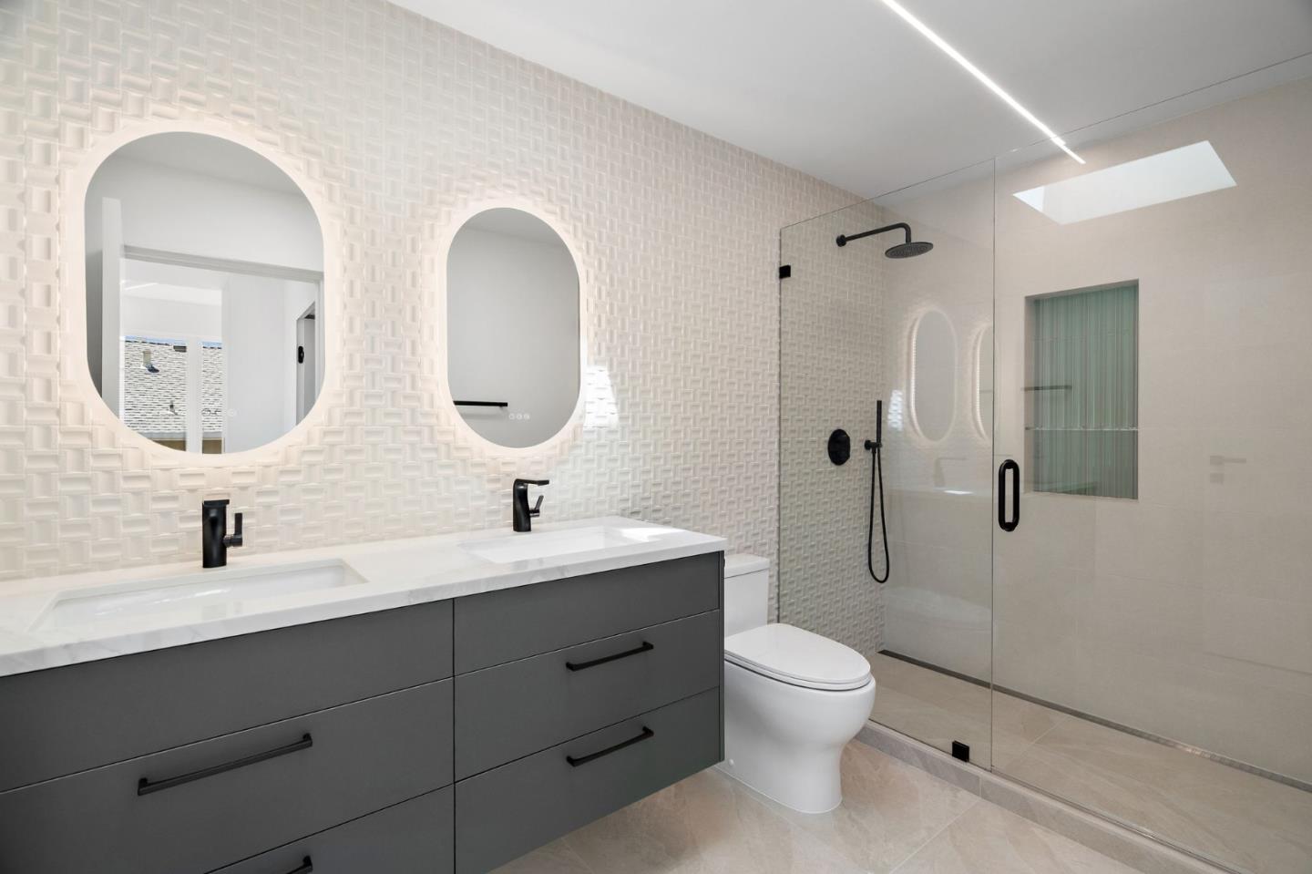 3886 Ross Road Palo Alto, CA 94303 - Photo 29 of 60 a bathroom with a toilet a sink and mirror