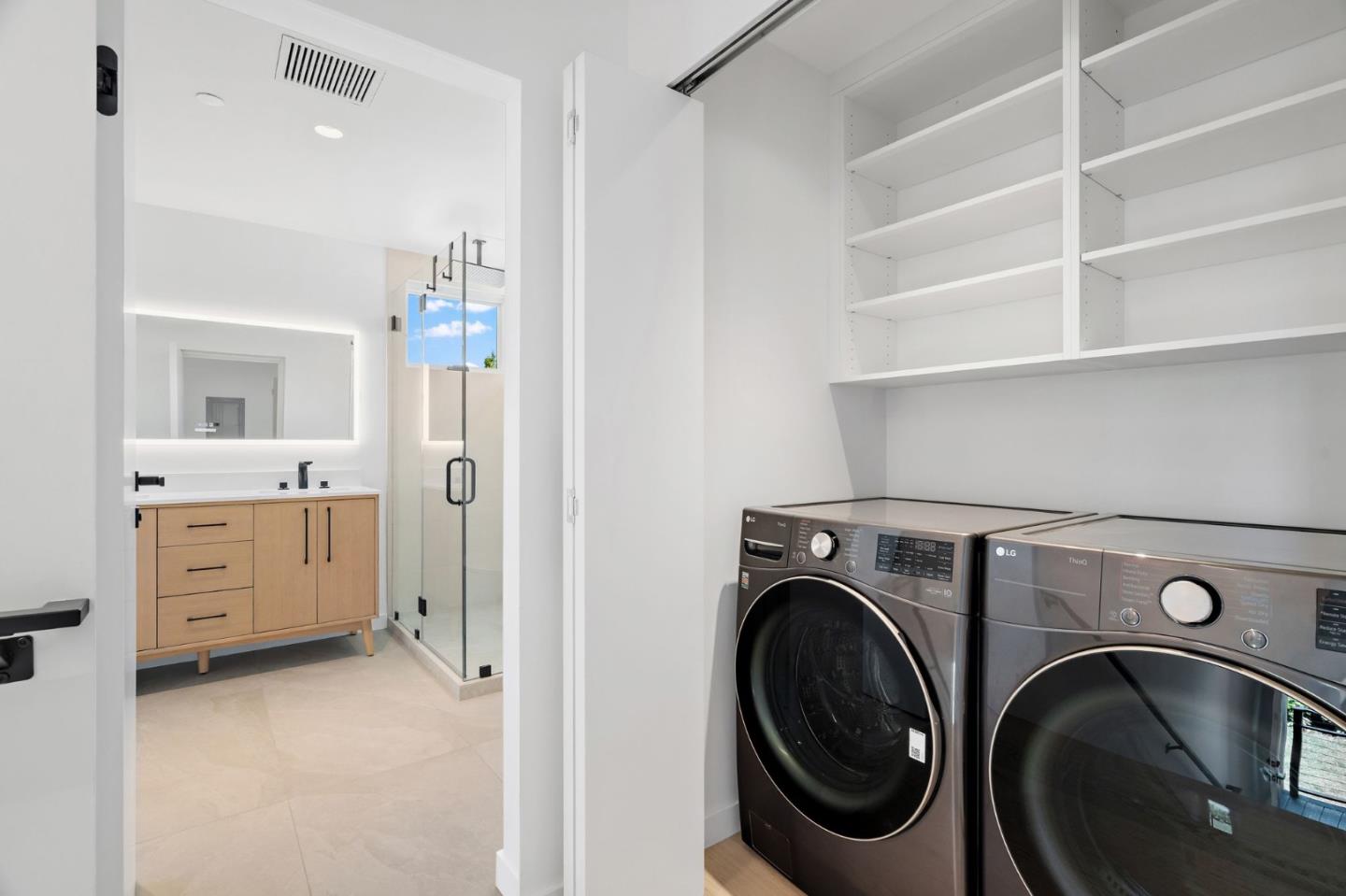 3886 Ross Road Palo Alto, CA 94303 - Photo 32 of 60 a view of a storage & utility room with washer and dryer