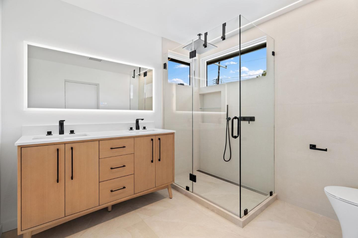 3886 Ross Road Palo Alto, CA 94303 - Photo 33 of 60 a bathroom with a double vanity sink toilet and shower