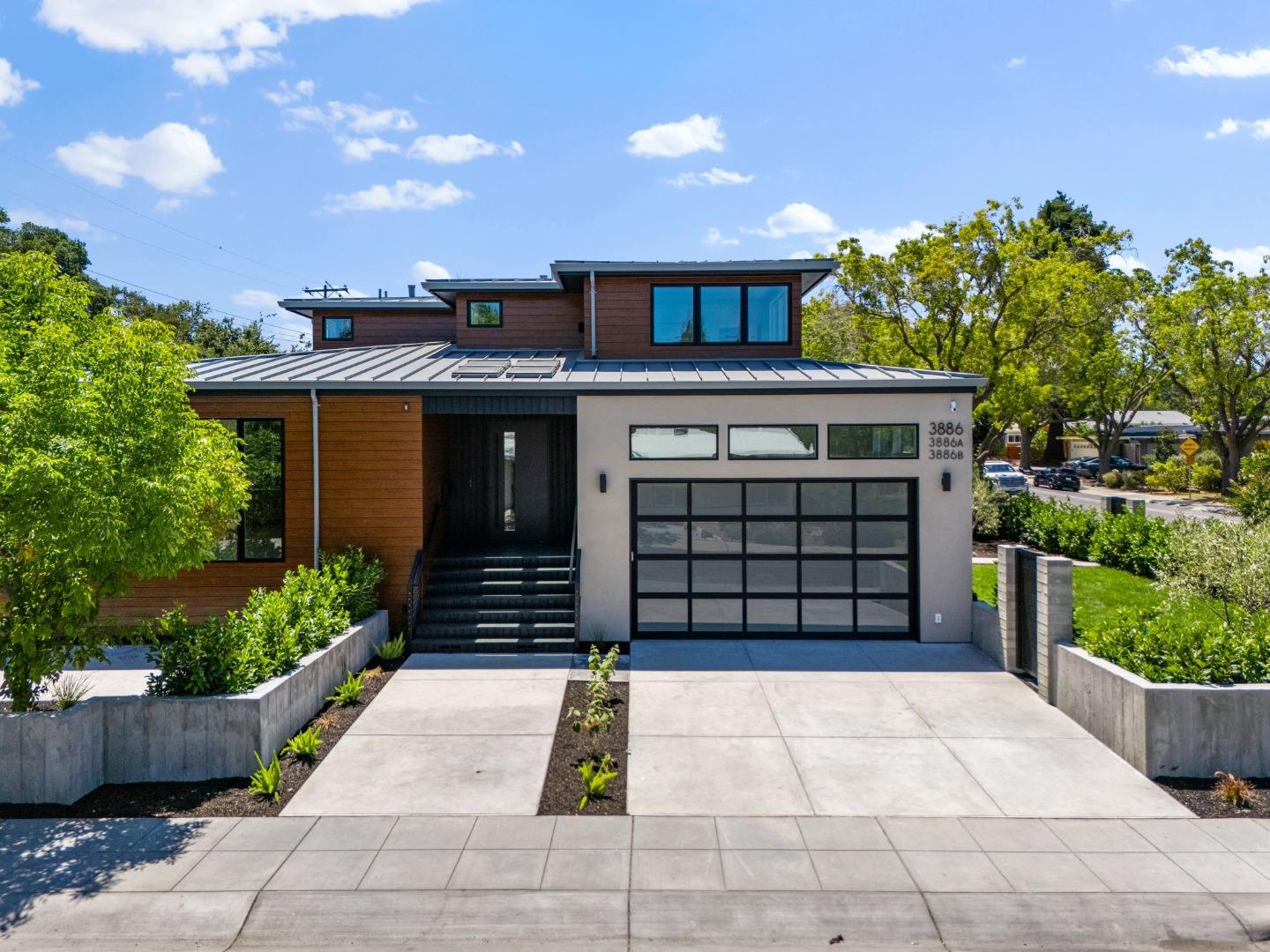 3886 Ross Road Palo Alto, CA 94303 - Photo 46 of 60 a front view of a house with a garden