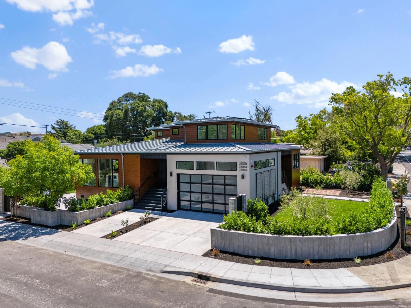 3886 Ross Road Palo Alto, CA 94303 - Photo 48 of 60 a front view of a house with a garden