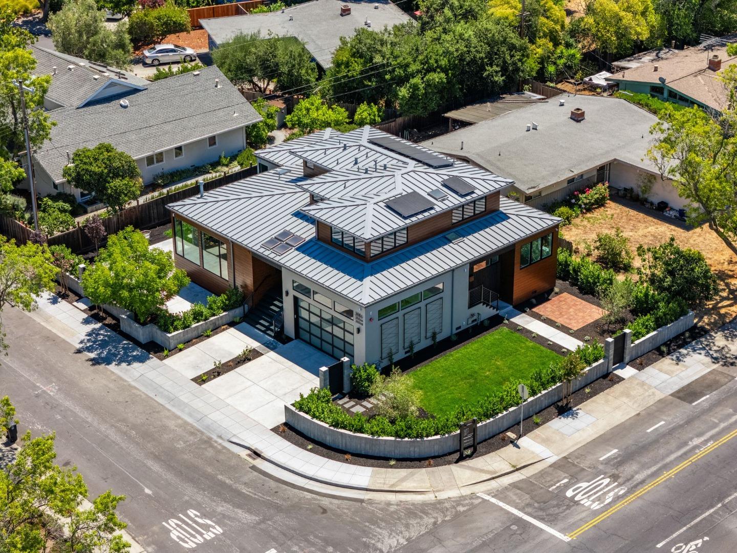 3886 Ross Road Palo Alto, CA 94303 - Photo 51 of 60 an aerial view of a house with a yard and potted plants