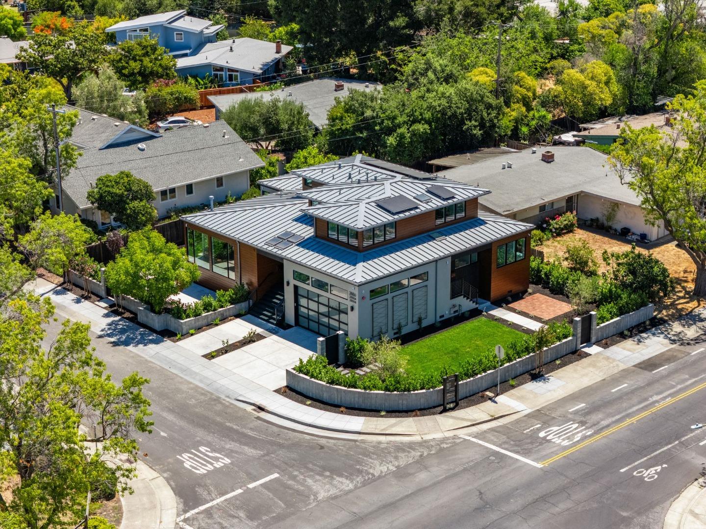 3886 Ross Road Palo Alto, CA 94303 - Photo 52 of 60 an aerial view of a house with a garden and plants