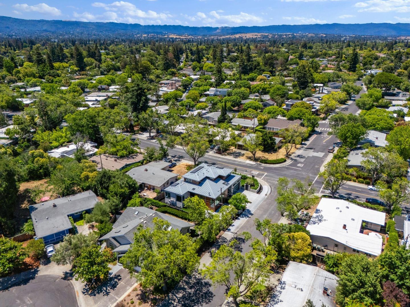 3886 Ross Road Palo Alto, CA 94303 - Photo 57 of 60 an aerial view of a city and mountain