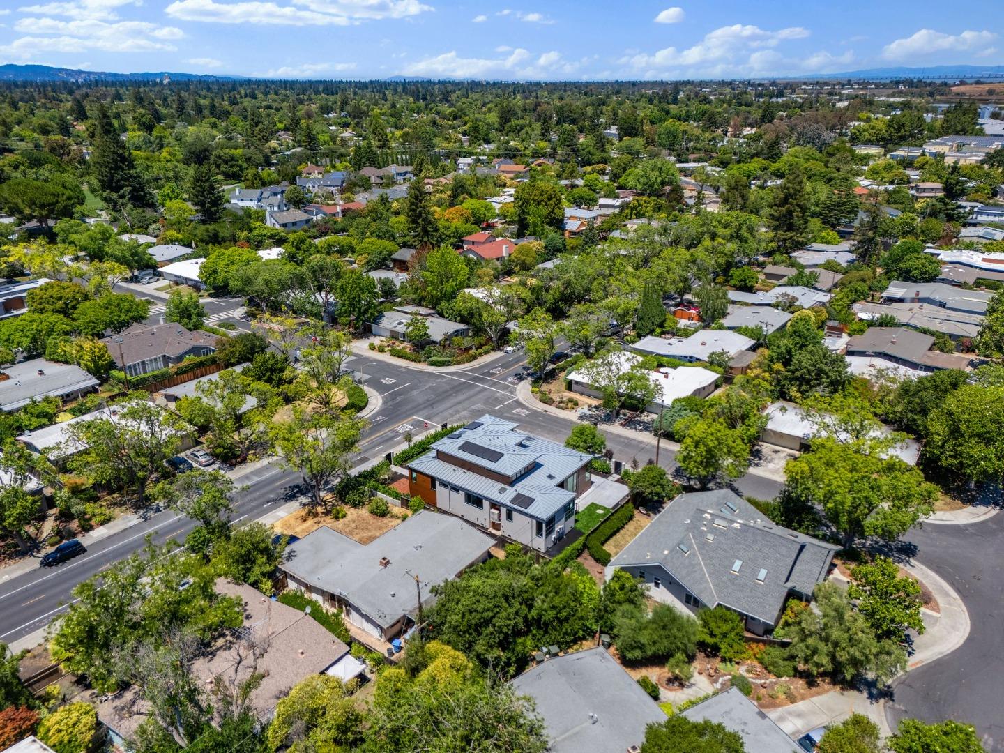 3886 Ross Road Palo Alto, CA 94303 - Photo 58 of 60 an aerial view of a house with a yard