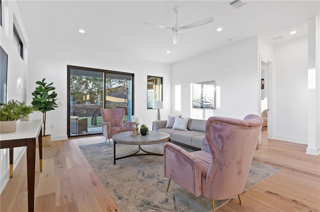 1004 Lott Avenue Austin, TX 78721 - Photo 3 of 39 a living room with furniture and a large window