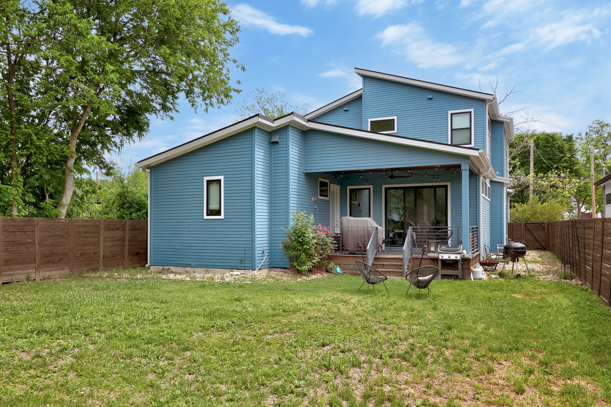 1004 Lott Avenue Austin, TX 78721 - Photo 37 of 39 a front view of house with yard and outdoor seating